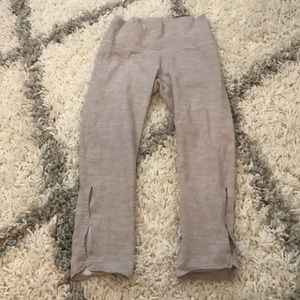 Aerie capri Light grey leggings. 2 Oval cut outs at bottom. Clinched waist